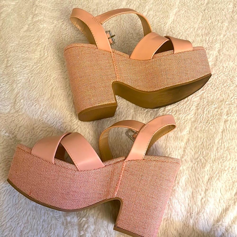 Pink platform shoes super cute and comfy. Slightly used.